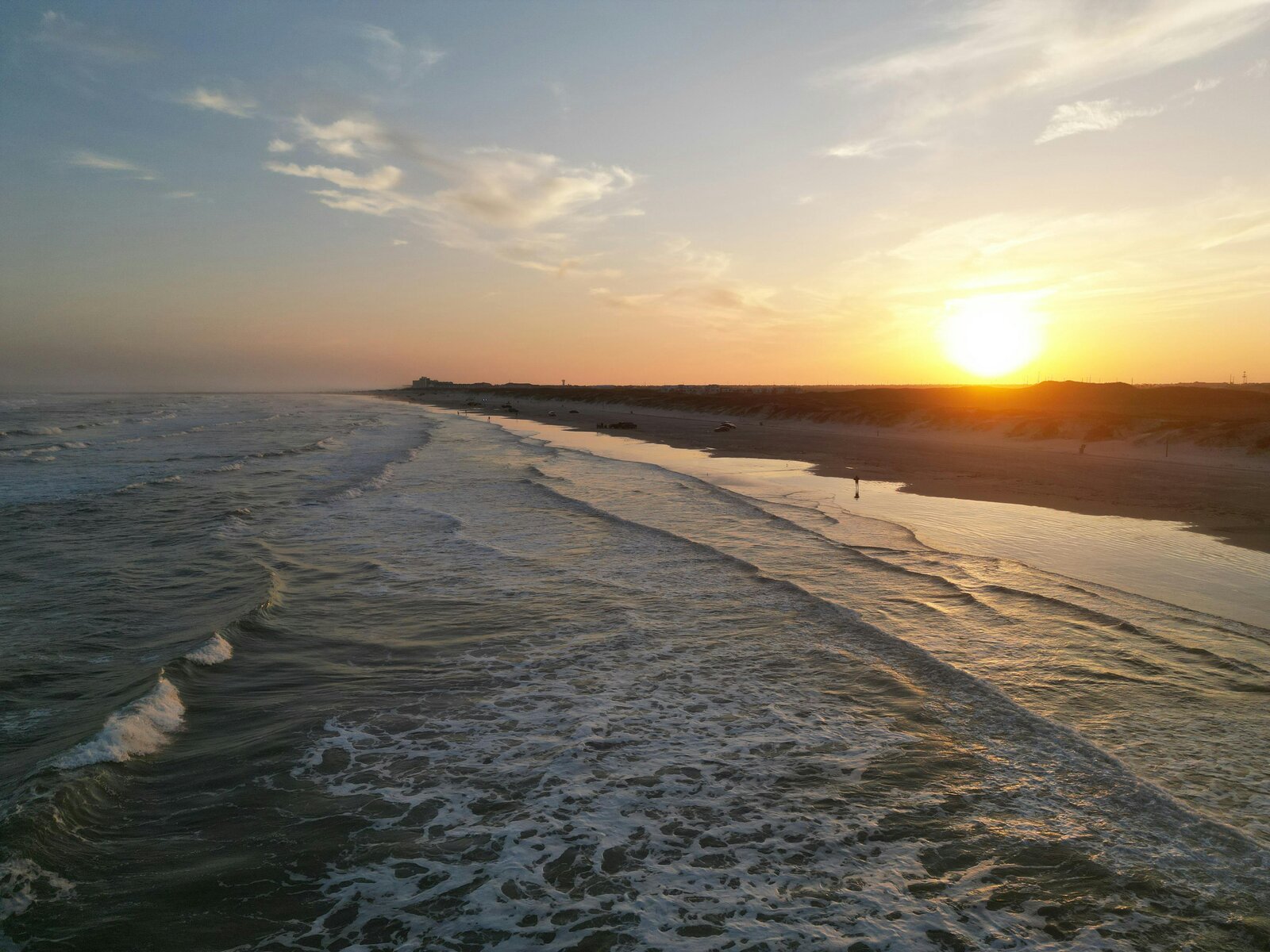 Sunset over Mustang Island beach near Port Aransas, Texas